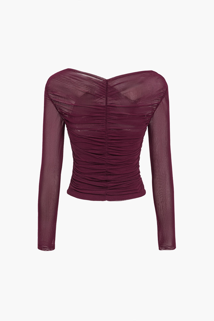 Versatile black ruched mesh long sleeve top, an elegant women's blouse ideal for evening events or night out.