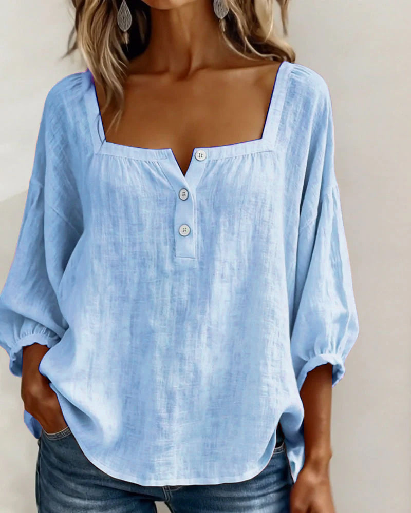 Women's elegant puff sleeve blouse, square neck, relaxed for spring/summer style.