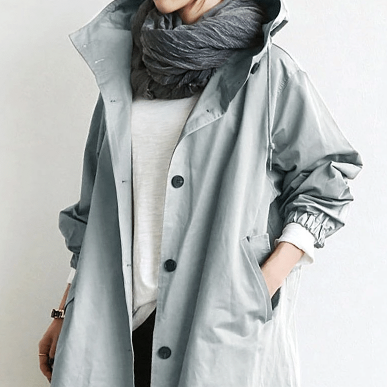 All-weather women's raincoat, casual & fashionable, with comfortable oversized fit.
