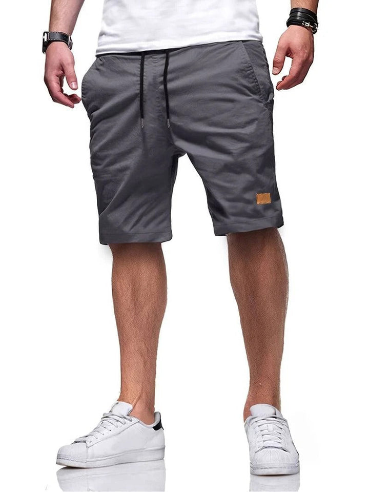 Versatile men's drawstring shorts, great for casual wear, lounging, or light athletic activities.