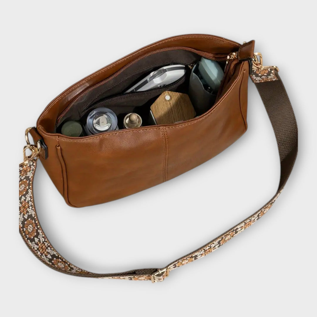 Elegant white vegan tote bag, an eco-friendly women's shoulder bag. Perfect chic fashion accessory.