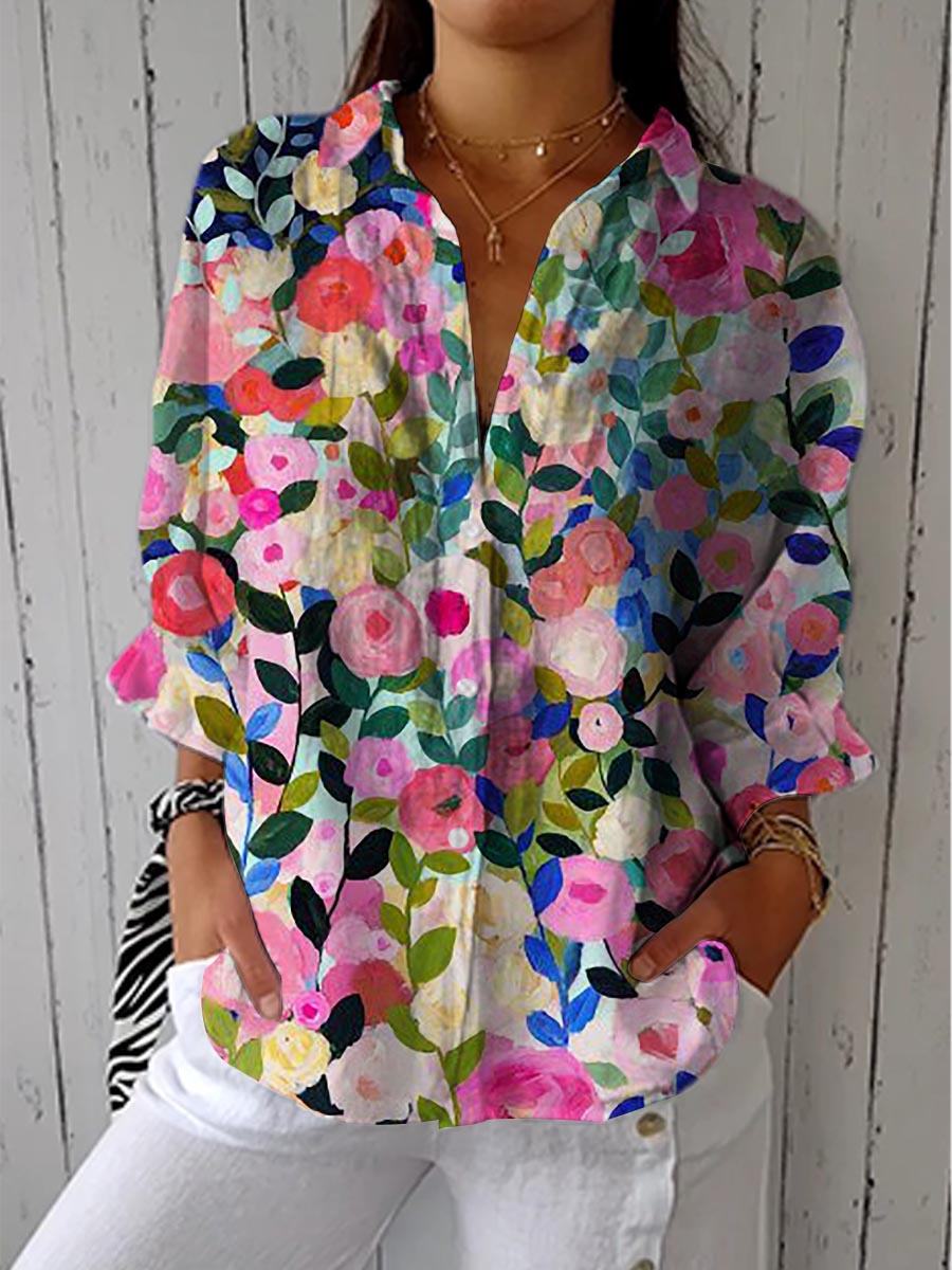 Elegant women's floral print blouse, perfect for spring/summer casual or stylish wear, offering comfort and effortless style.