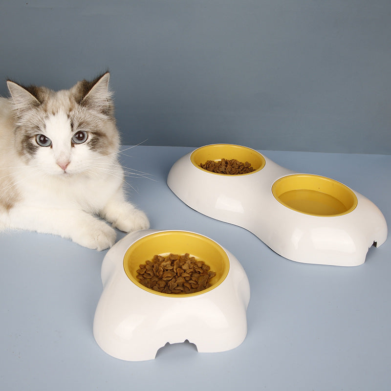 Bright yellow non-slip pet feeding station with double stainless steel bowls for dogs & cats. Easy clean accessory.