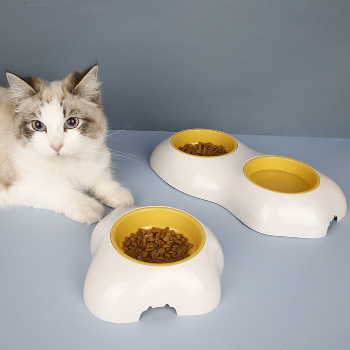 Bright yellow non-slip pet feeding station with double stainless steel bowls for dogs & cats. Easy clean accessory.