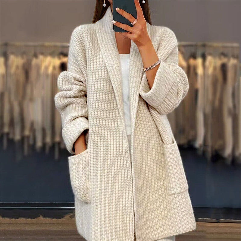 Women's cozy oversized open-front cardigan, perfect for fall & winter layering. Chic & comfortable long-sleeve knitwear.