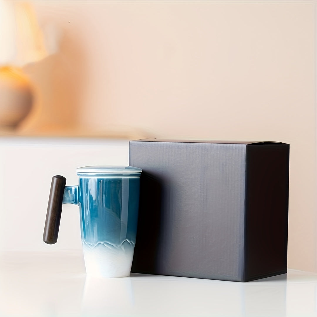 Handmade ceramic tea mug with integrated strainer for effortless loose leaf tea brewing.