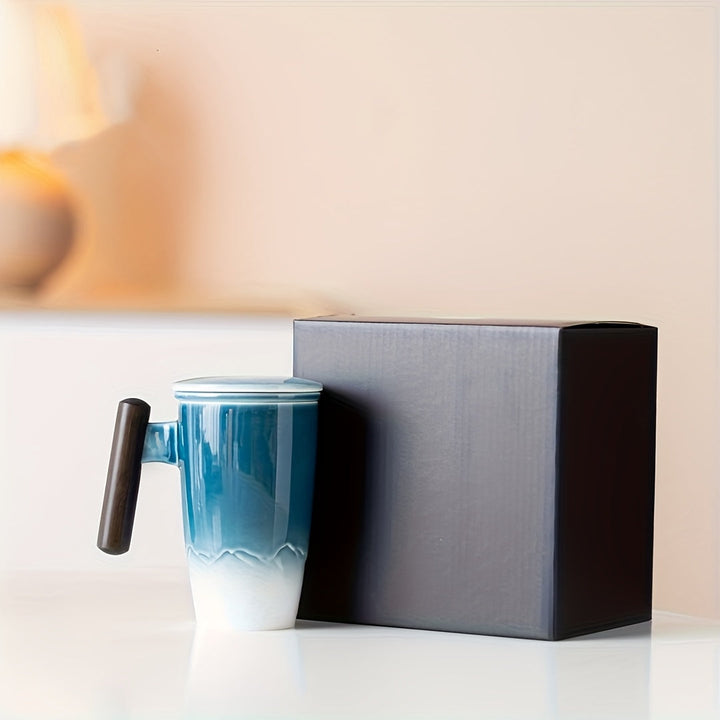 Handmade ceramic tea mug with integrated strainer for effortless loose leaf tea brewing.