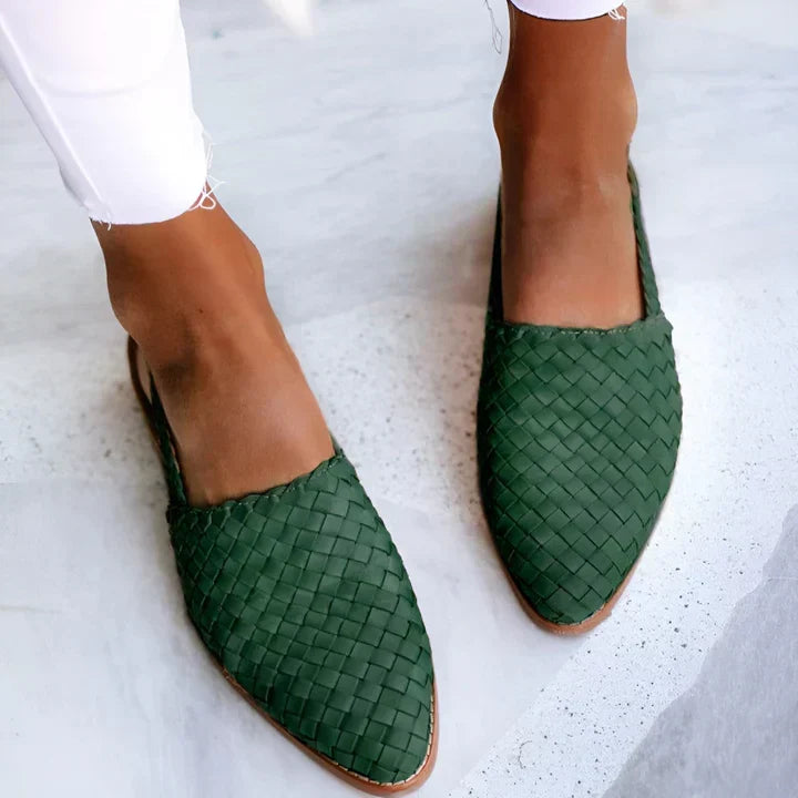 Close-up of elegant women's open-toe slingback sandals, showcasing comfortable design for stylish summer footwear.