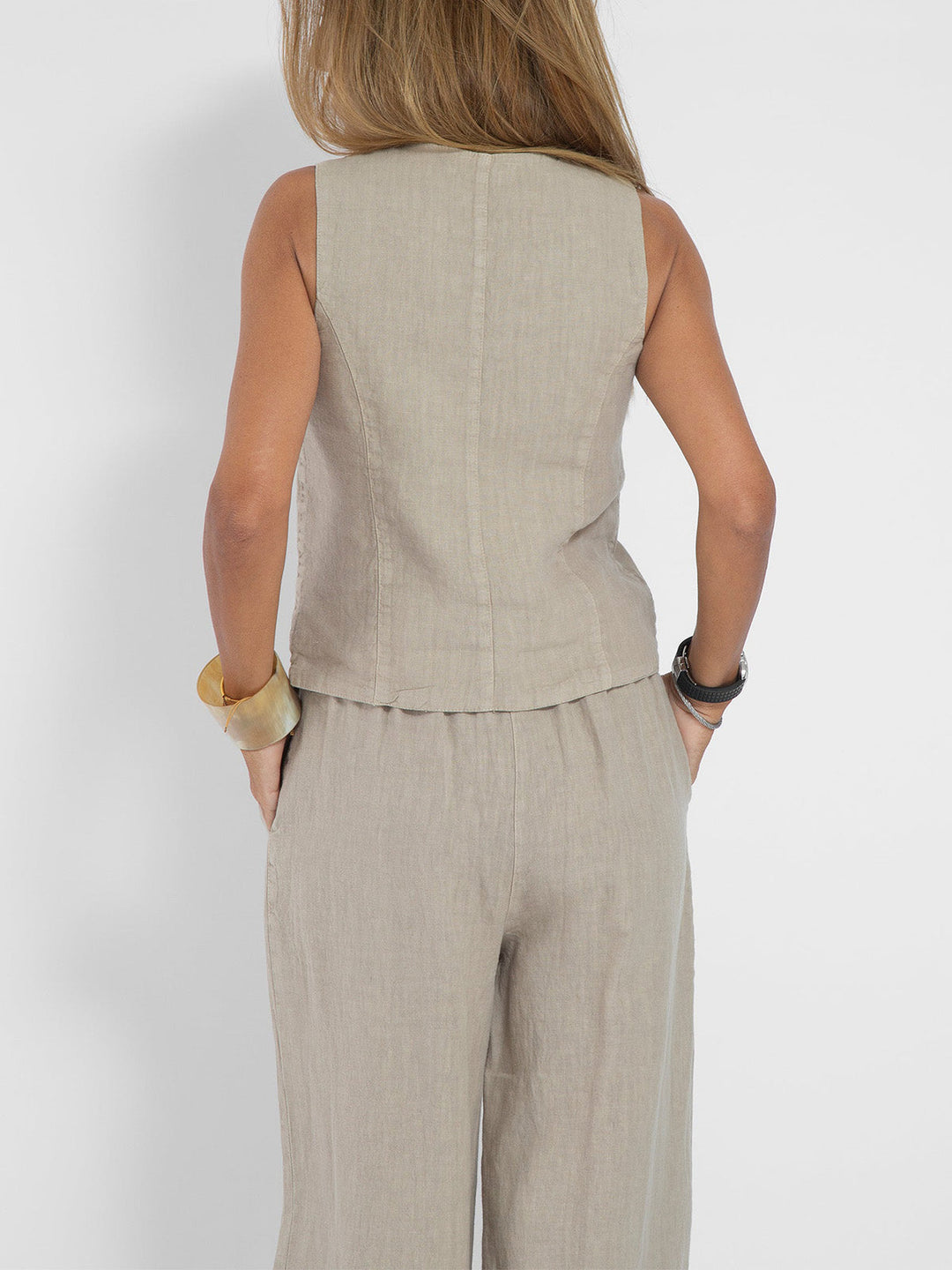 Versatile women's clothing set with a V-neck vest and stylish wide-leg trousers for smart casual.
