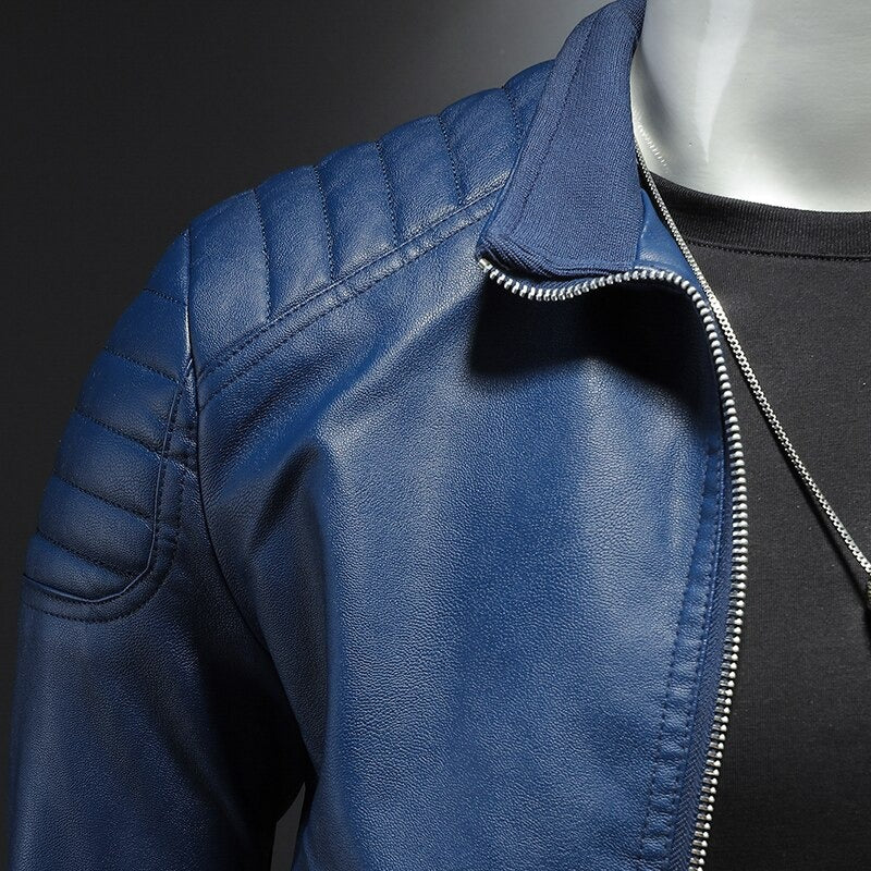 Stylish men's black slim-fit biker jacket featuring quilted shoulders, stand collar, and zipper pockets.