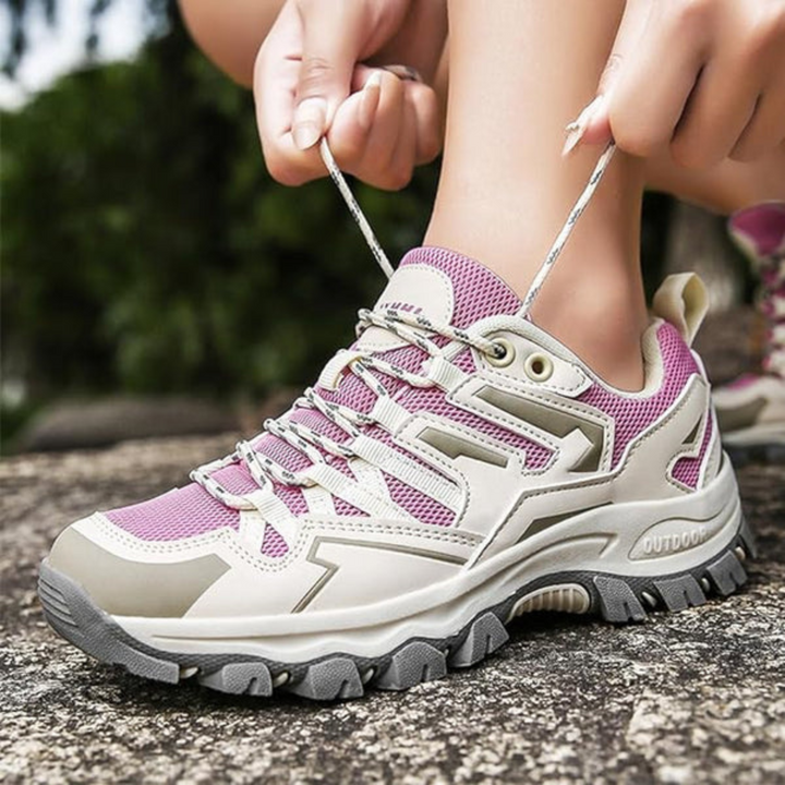 Sporty women's hiking shoes with superior grip for challenging terrain. Comfortable outdoor footwear for active women.