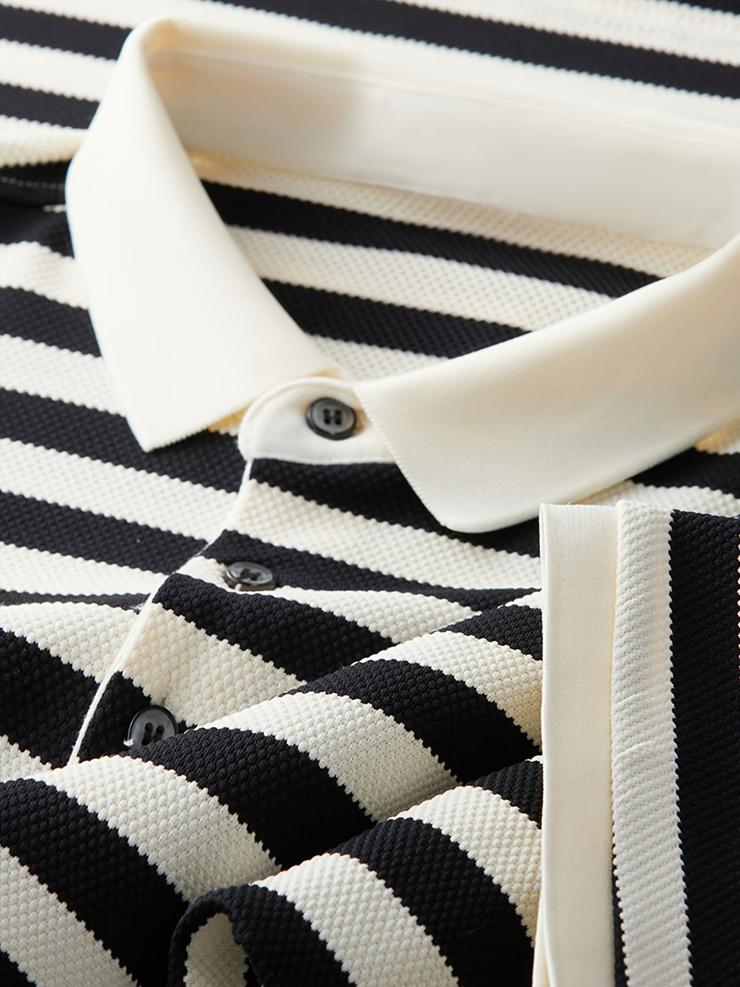 Stylish men's striped short sleeve polo shirt, designed with a distinctive contrast collar for a modern casual look.