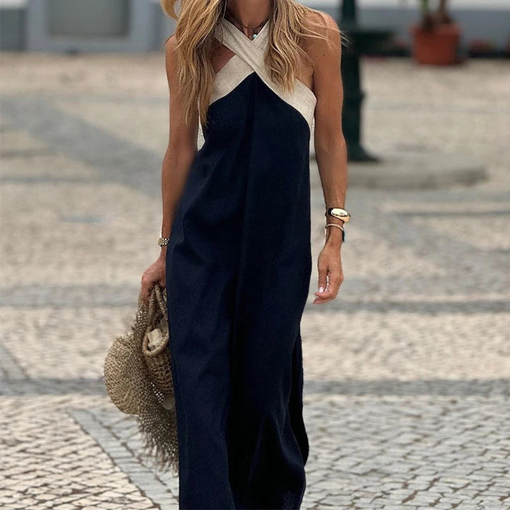 Chic women's cross neck maxi dress. Elegant, sleeveless, and long, ideal for special occasion & formal wear.