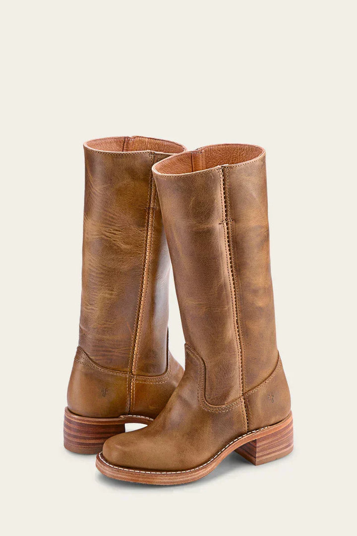 Stylish women's western boots, classic pointed toe, versatile footwear for any fashion ensemble.