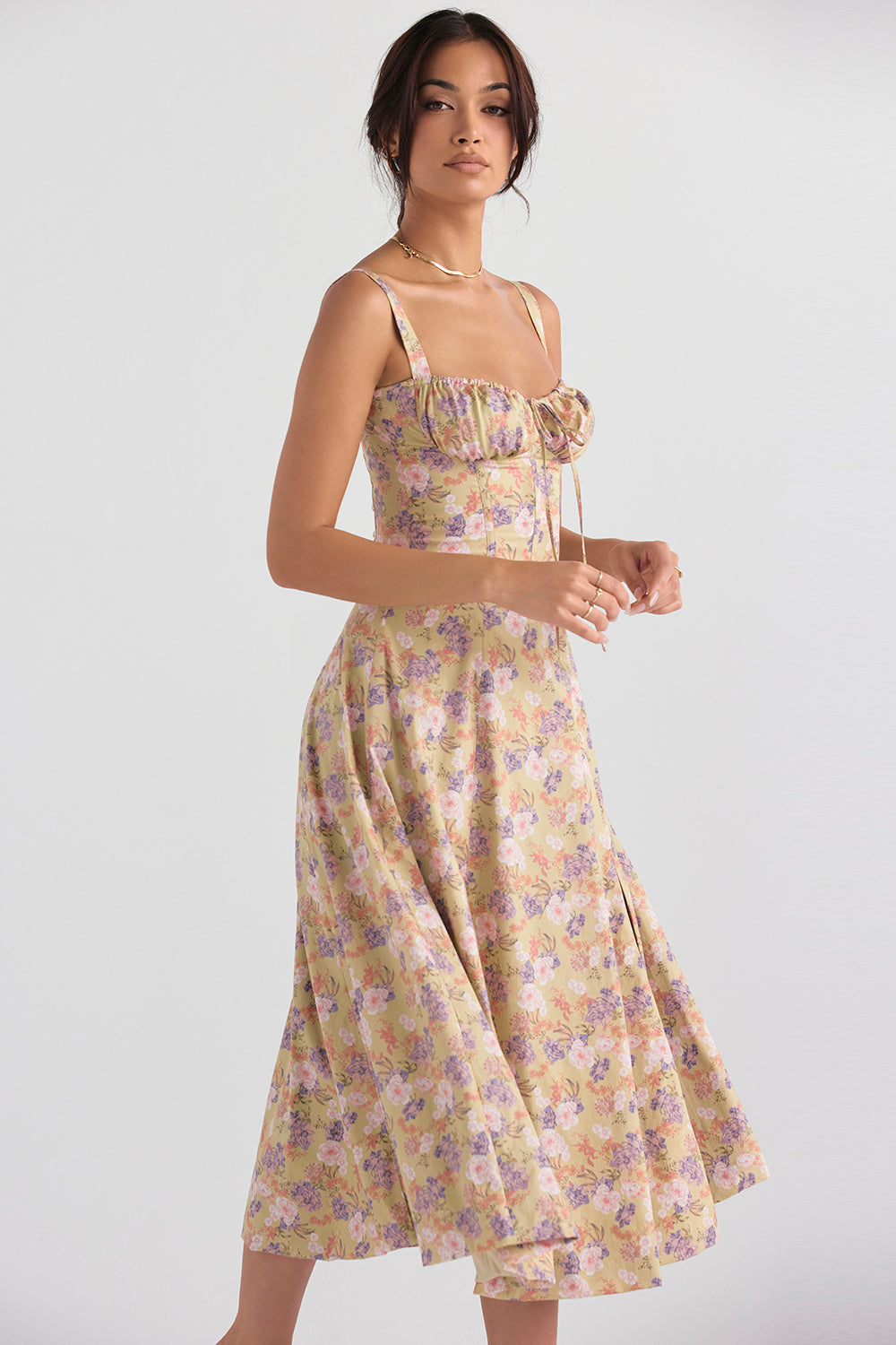 Floral print bustier midi dress for women, ideal for spring events. Elegant and chic design.