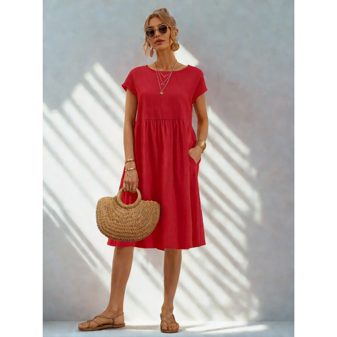 Women's comfortable casual midi dress with pockets, perfect for everyday wear.