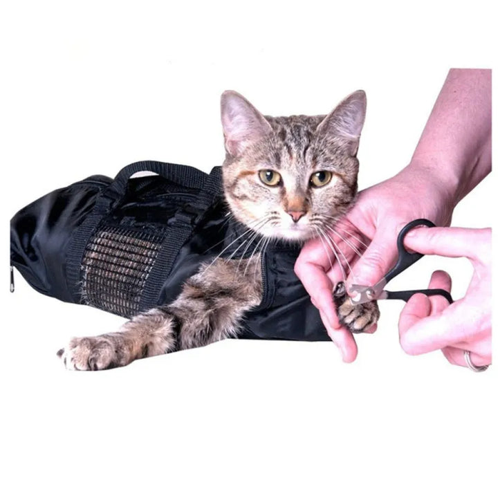 Gentle cat grooming restraint bag, ideal for managing difficult cats during ear cleaning, nail trims & vet visits.