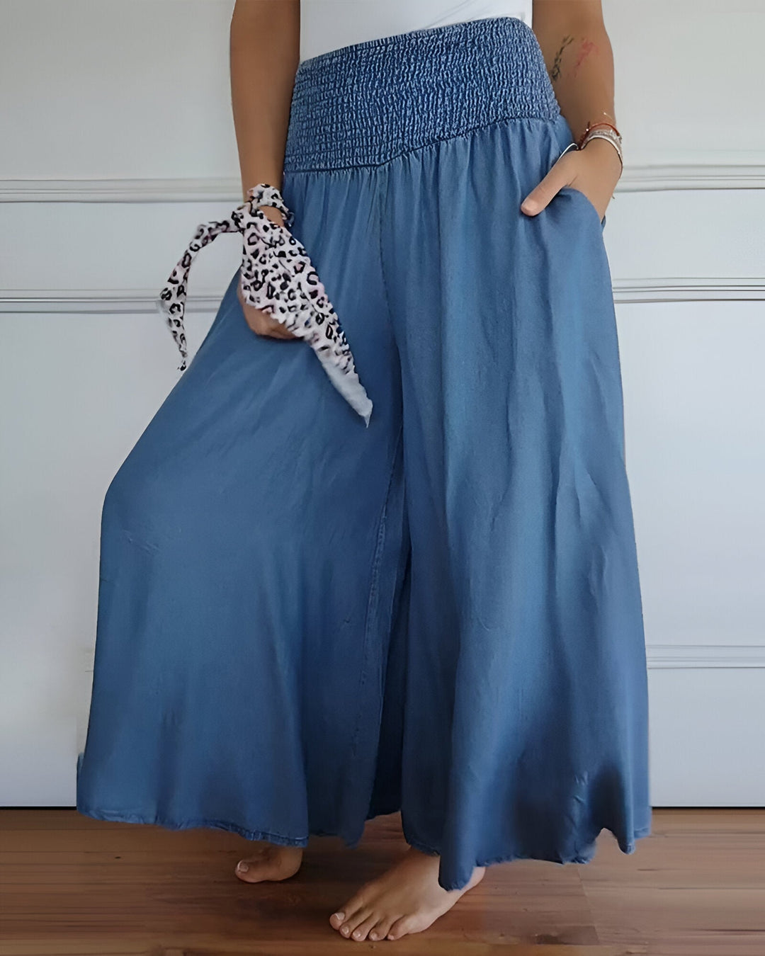 Versatile flowy maxi skirt for women, ideal for spring & summer fashion. Effortless style with smocked waist.