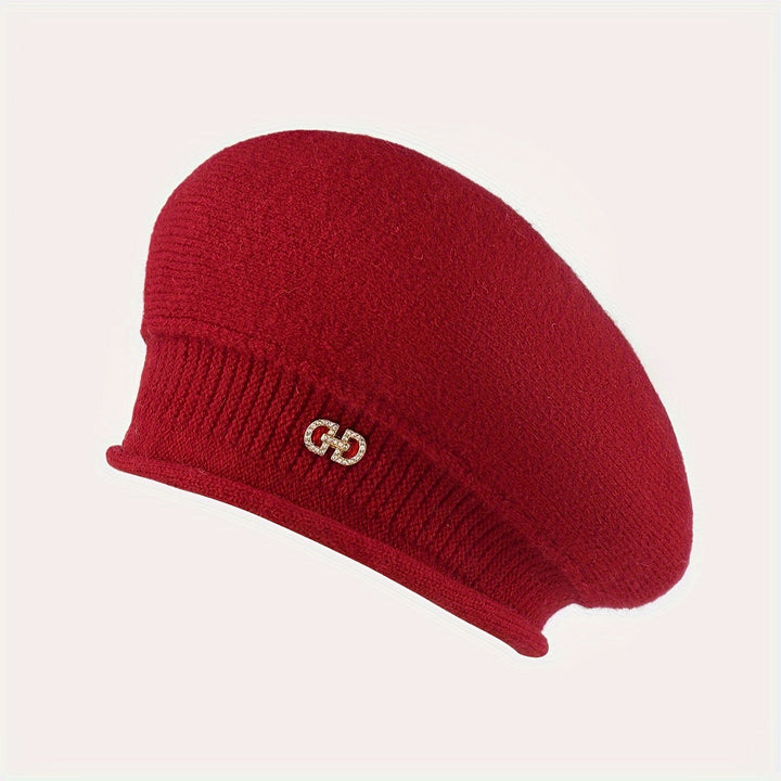 Beautifully knitted women's beret. Chic winter hat, providing soft warmth for elegant style.