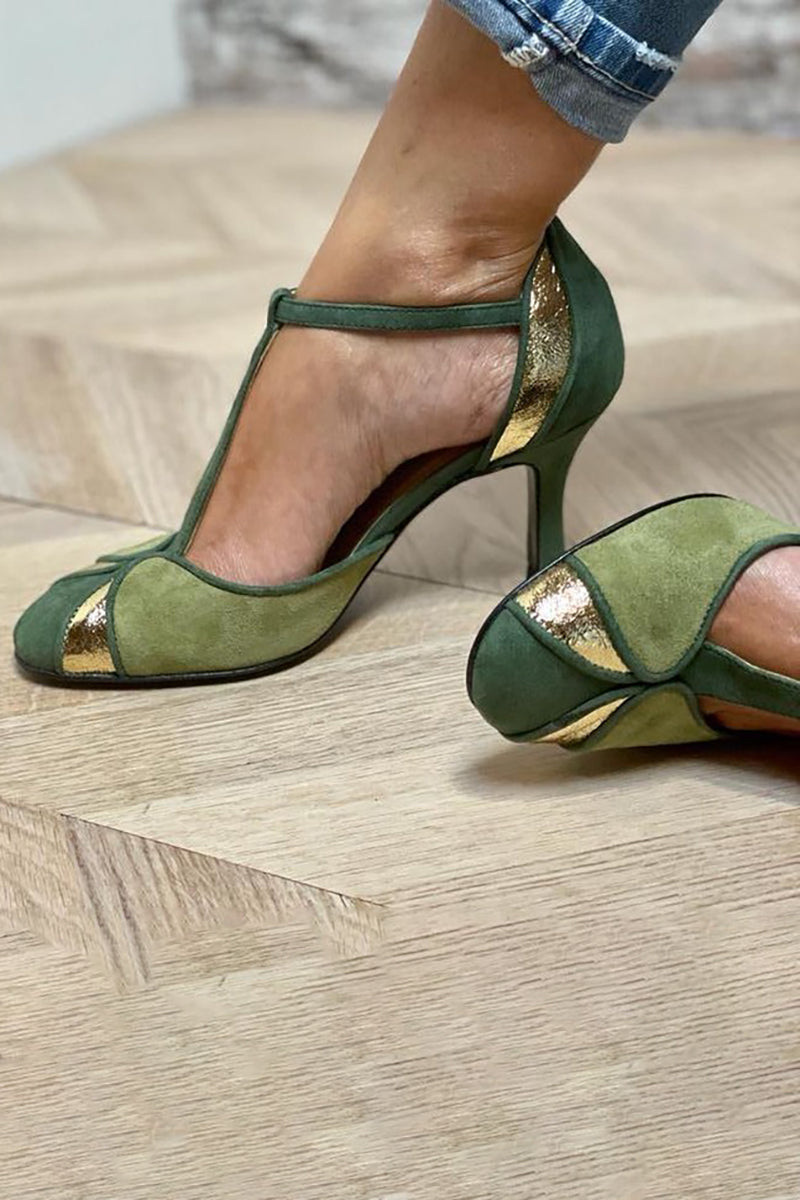 Stylish green T-strap Mary Jane shoes for women, featuring a slim heel and elegant closed toe.