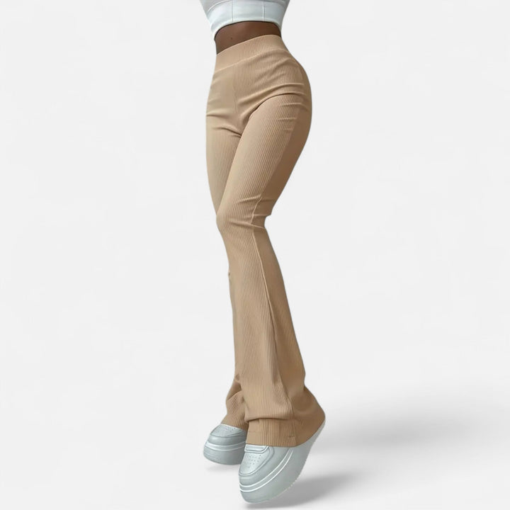 Comfortable women's ribbed high-waist slim leggings, offering a sleek and versatile style for daily fashion.