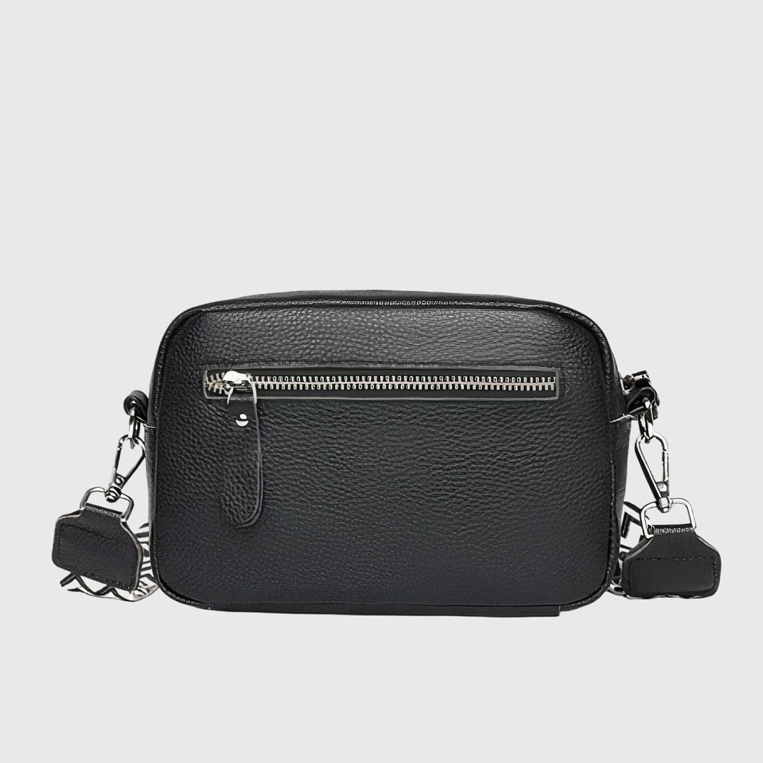 Versatile women's leather shoulder bag. Stylish and functional for daily essentials.
