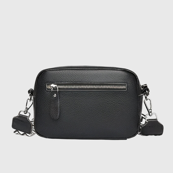 Versatile women's leather shoulder bag. Stylish and functional for daily essentials.