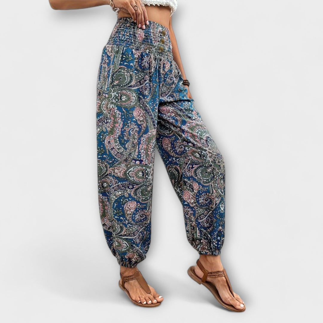 Chic women's ethnic patterned trousers, blending comfort with a stylish graphic print.