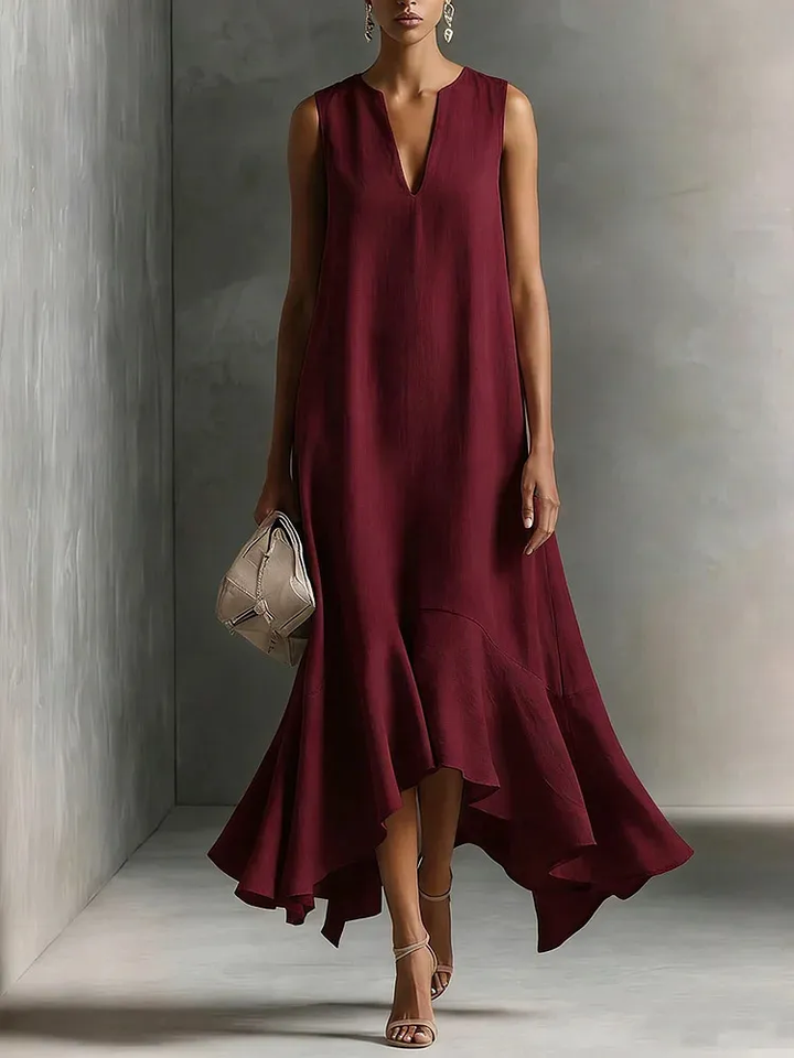 Casual yet elegant women's V-neck sleeveless flowing maxi dress with ruffled hem for summer.