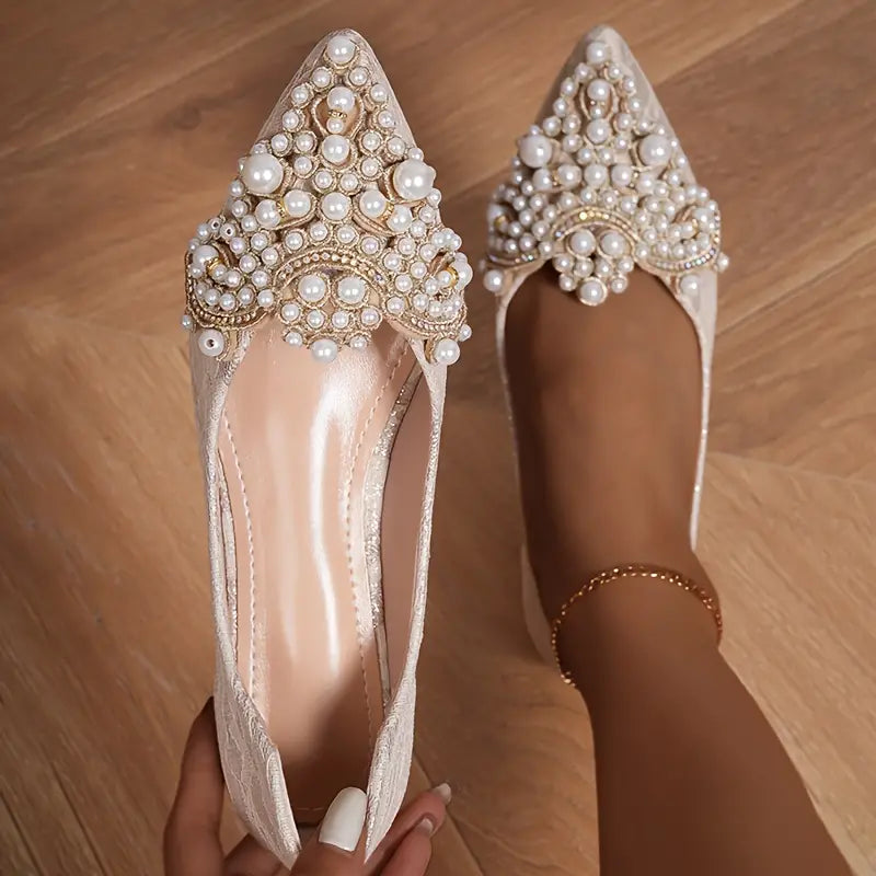 Elegant women's bridal ballet flats with delicate lace overlay & pearl embellishments, perfect for weddings & special occasions.