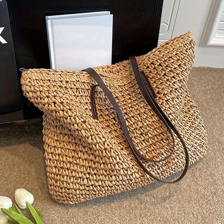 Chic women's large woven tote, a versatile bohemian shoulder bag for beach and travel.