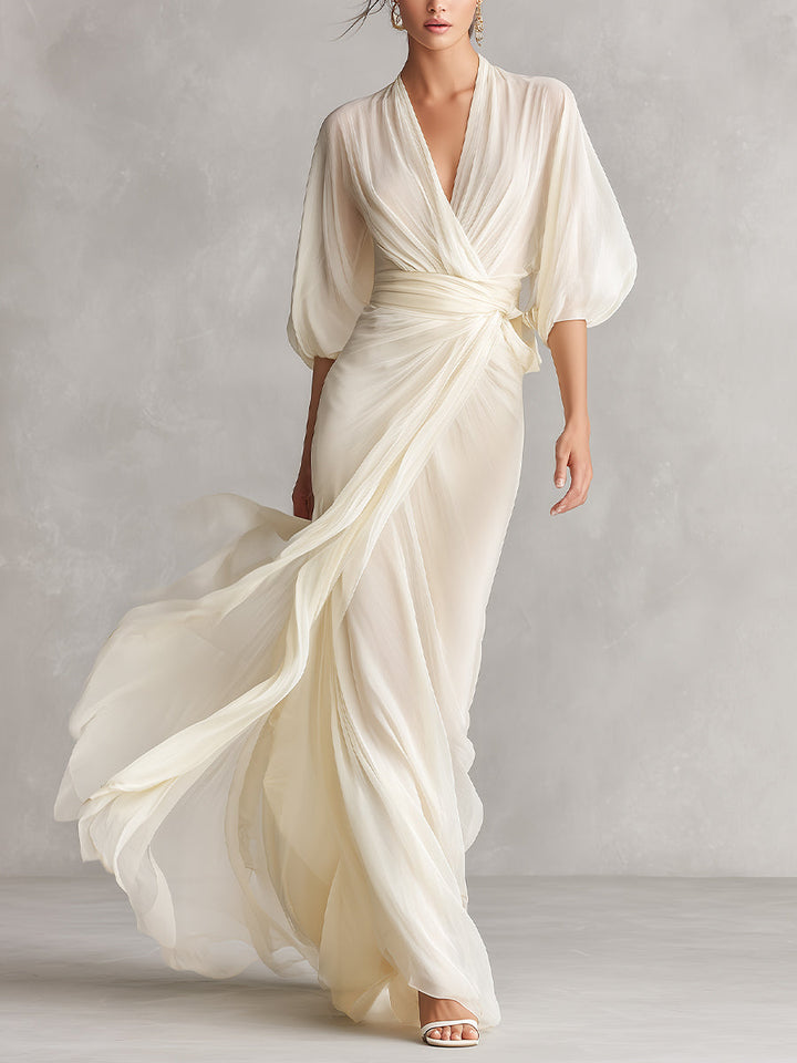 Women's ivory sheer wrap maxi dress with elegant puff sleeves, perfect for formal events & special occasions.