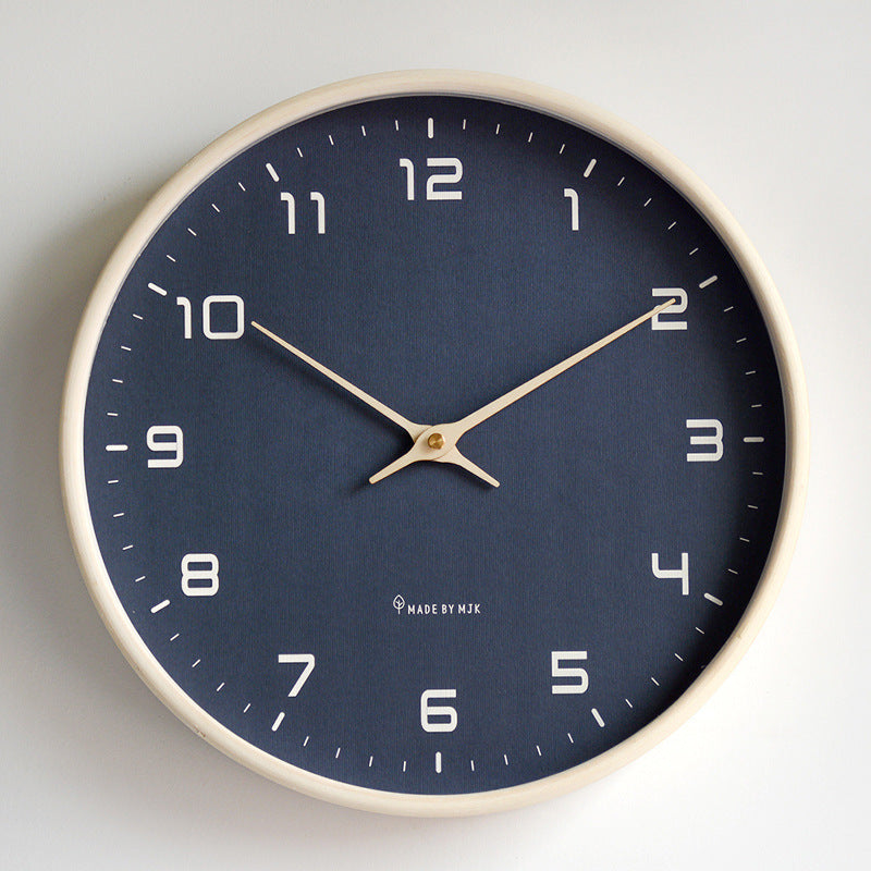 Scandinavian-style minimalist wall clock, wooden frame. Enhances modern living room, bedroom, or office decor.