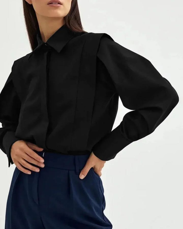 Elegant women's boxy button-down blouse, a versatile top for sophisticated casual & office wear.