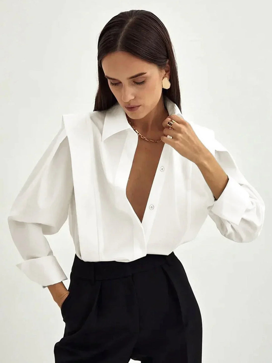 Elegant women's boxy button-down shirt in a modern, versatile design for chic fashion.