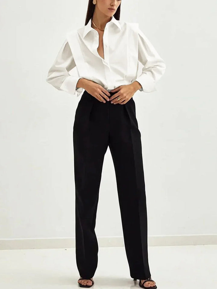 Chic women's boxy button-down shirt blouse for versatile styling in modern fashion.