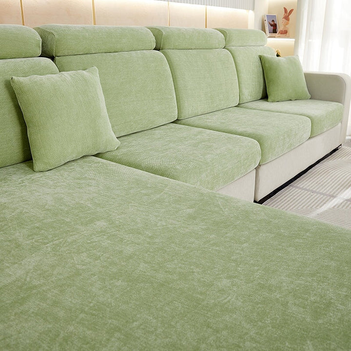 "Chenille sectional sofa cover in smoke color, fits snugly on sectional sofas to protect against wear, spills, and stains."