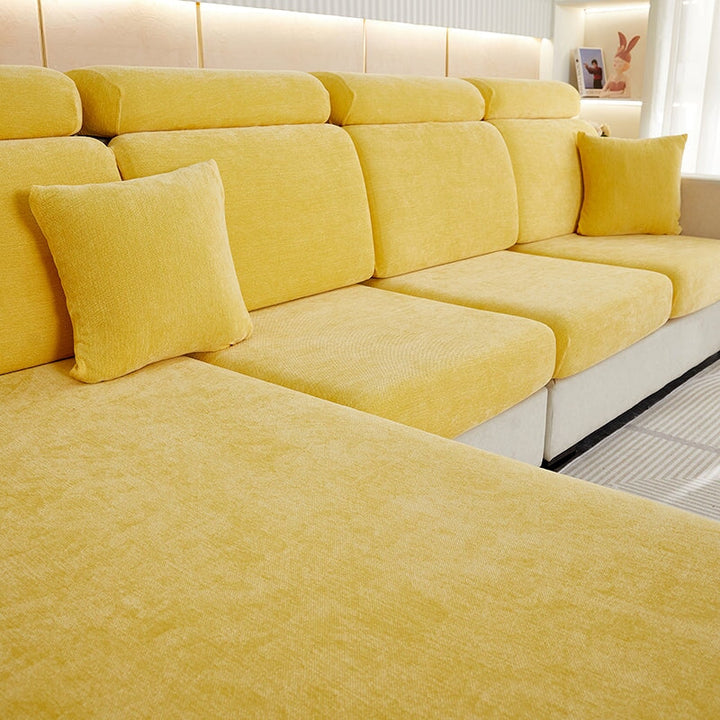 "Chenille sectional sofa cover in smoke color, fits snugly on sectional sofas to protect against wear, spills, and stains."