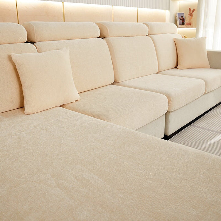 "Chenille sectional sofa cover in smoke color, fits snugly on sectional sofas to protect against wear, spills, and stains."