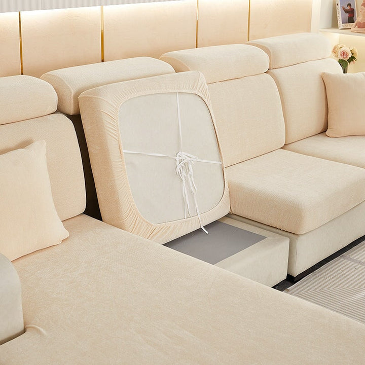 "Chenille sectional sofa cover in smoke color, fits snugly on sectional sofas to protect against wear, spills, and stains."