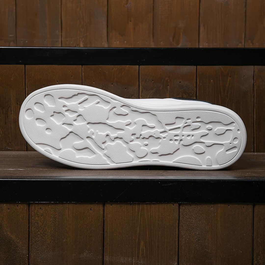 New women's fashion sneakers: chic white low-tops with a modern minimalist design.