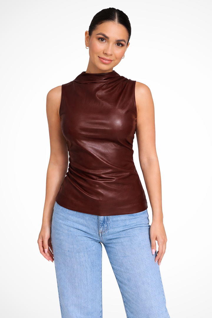 Elegant women's high neck sleeveless top for summer. Versatile wardrobe essential in a chic black design.