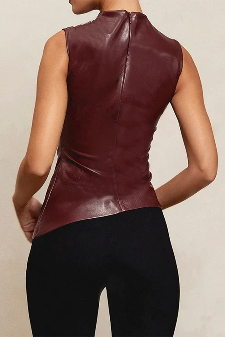 Modern women's sleeveless high neck top. Versatile brown summer wear for chic, smart casual styling.