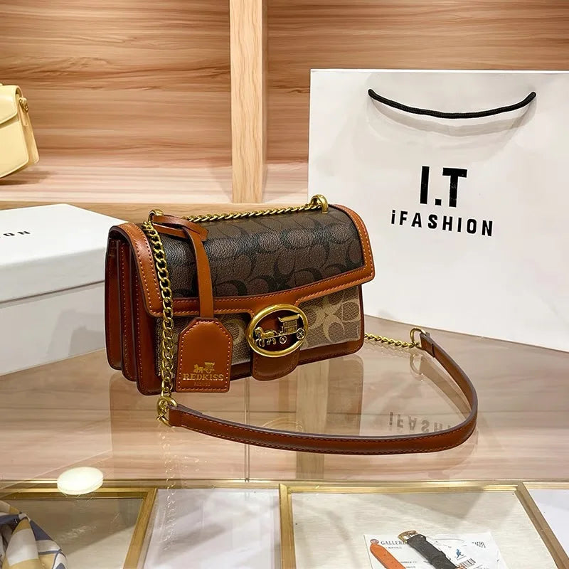 Elegant colorblock crossbody bag for women, a chic fashion accessory featuring a beautiful gold chain.