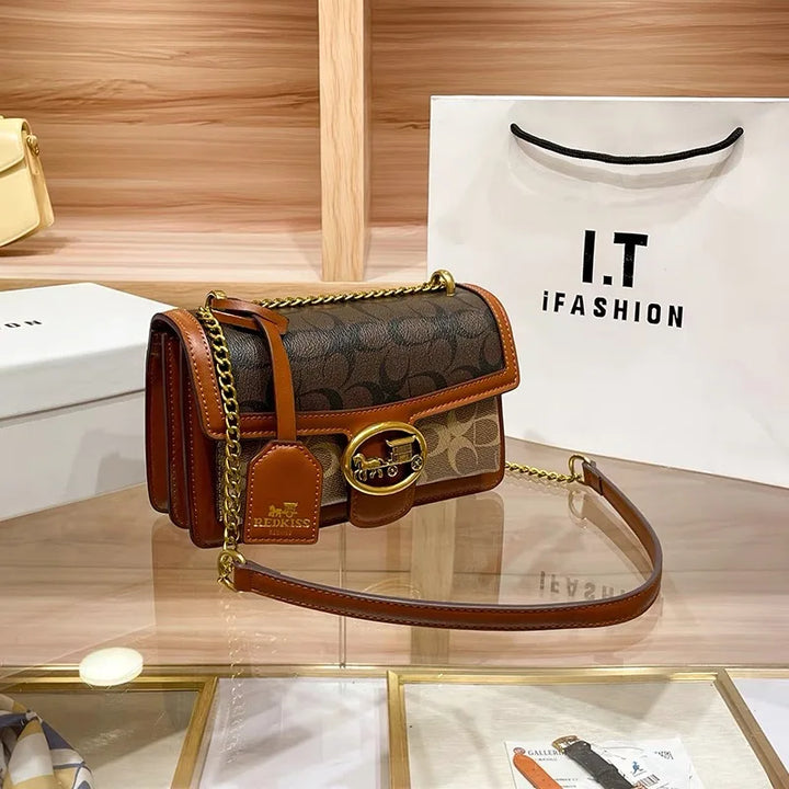 Elegant colorblock crossbody bag for women, a chic fashion accessory featuring a beautiful gold chain.