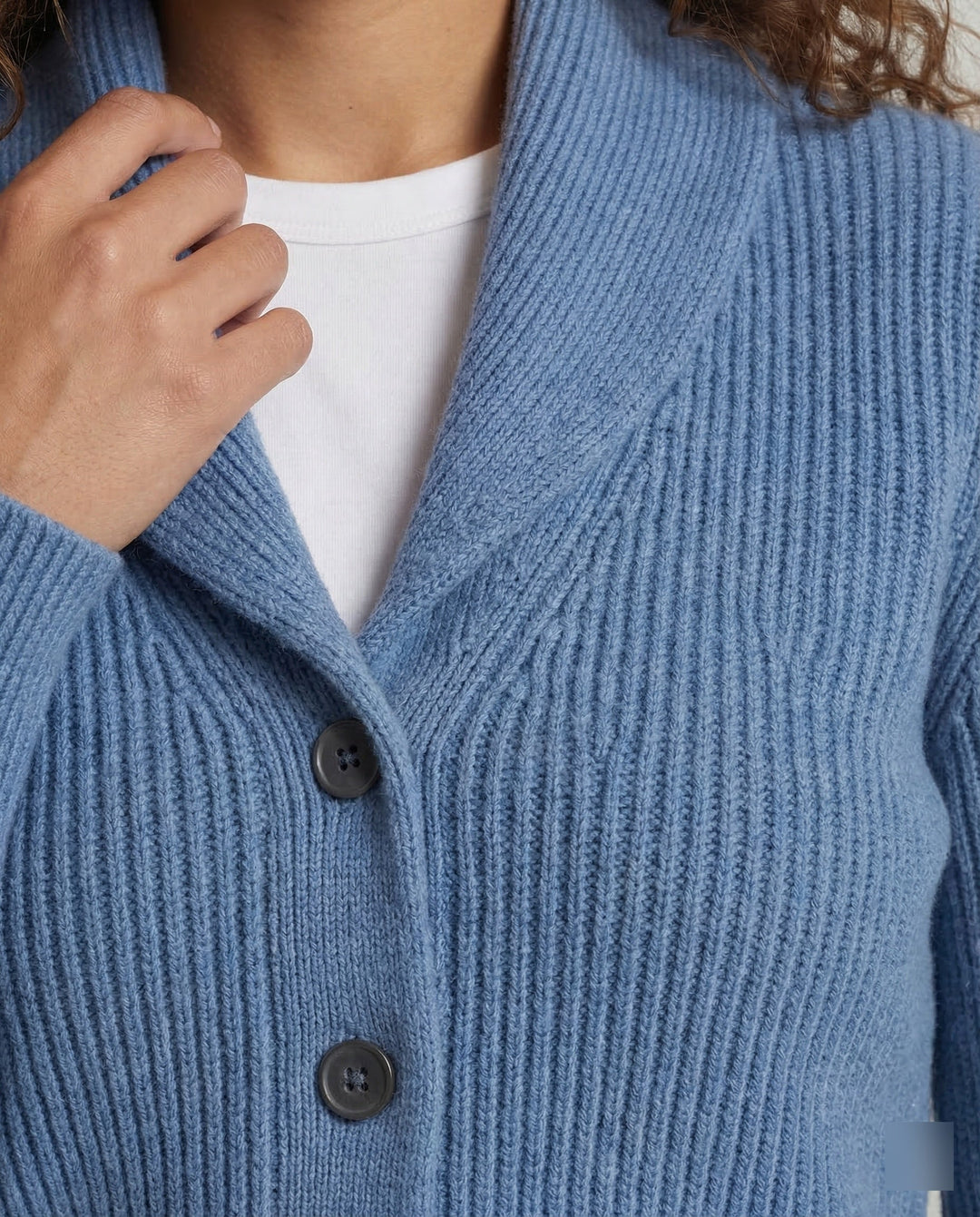 Casual women's button-front cardigan with a stylish lapel collar & long sleeves. Versatile for everyday layering and fashion.