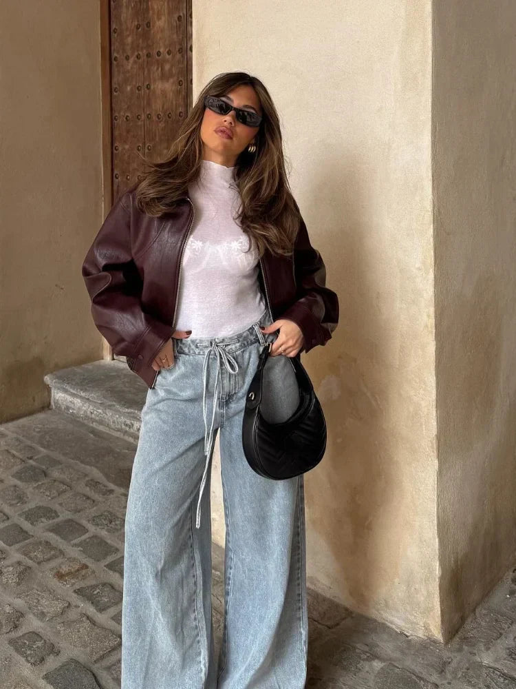 Fashionable women's oversized urban leather jacket, waist-length, great for spring/autumn casual outerwear.