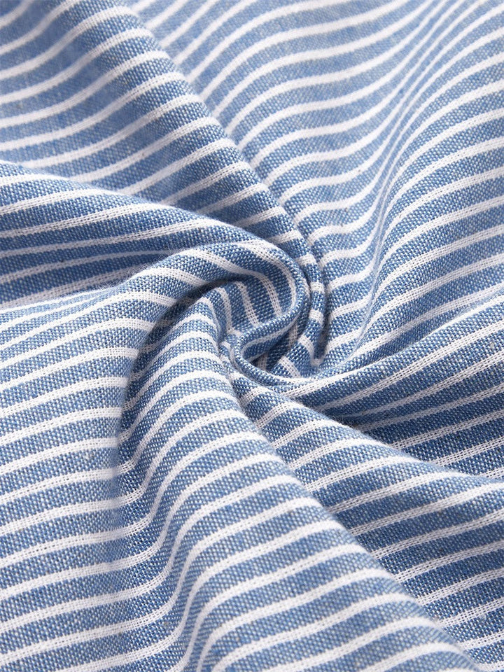 Flattering striped midi dress for women featuring front button details & 3/4 sleeves, stylish summer wear.