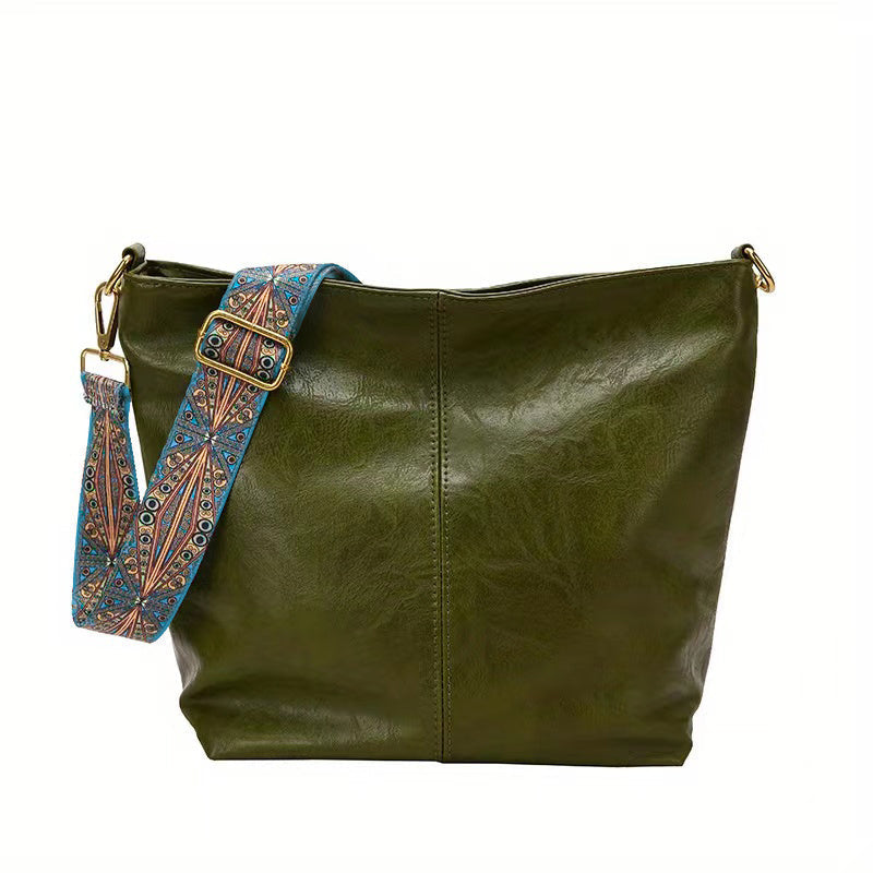 Stylish women's elegant tote bag with a spacious interior, a chic accessory for any occasion.