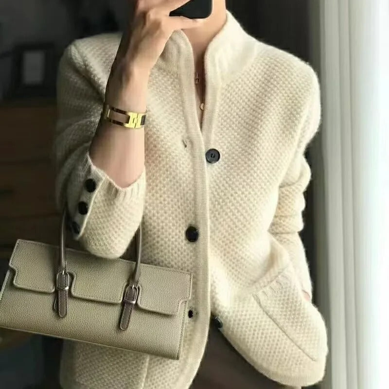 Chic women's textured knit button-up cardigan jacket, perfect for casual layering in fall or spring fashion.